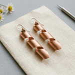 Pair of spiral copper earrings, hand-twisted design