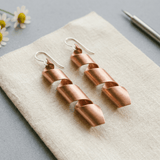 Pair of spiral copper earrings, hand-twisted design