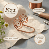 Copper hand spiral jewellery worn across the hand