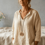 Woman wearing a spiral pendant copper necklace