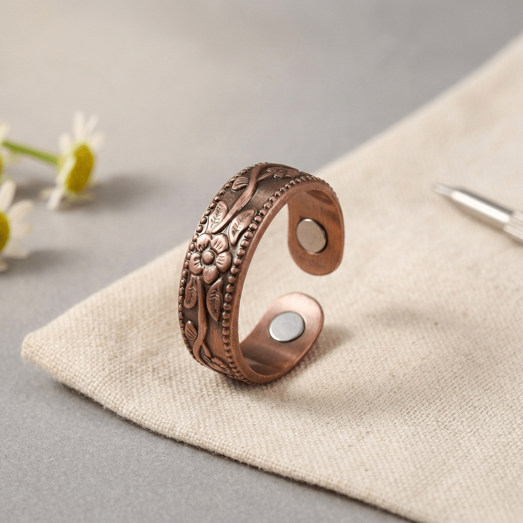 Woman wearing a floral engraved copper ring