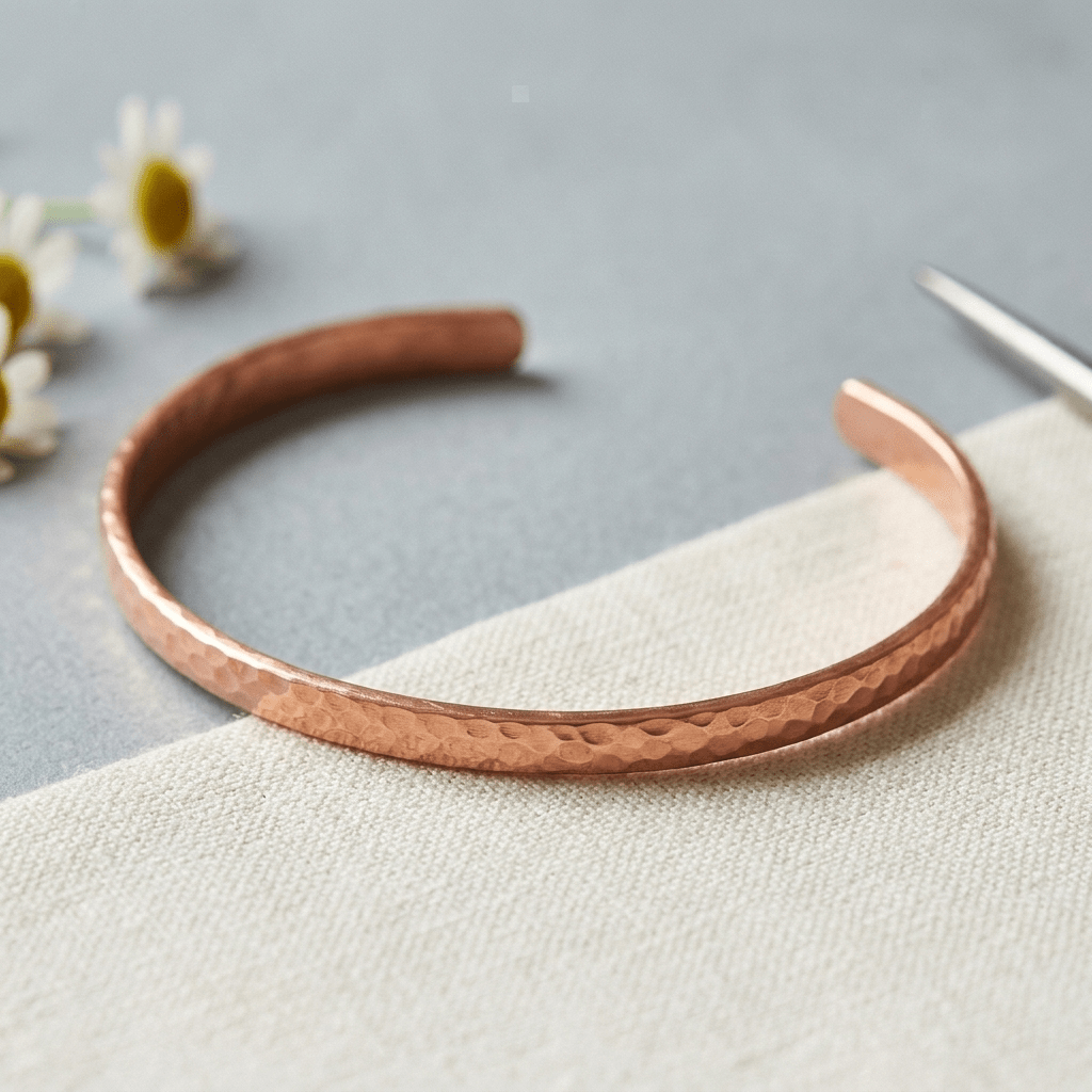 Woman wearing a hammered copper anklet