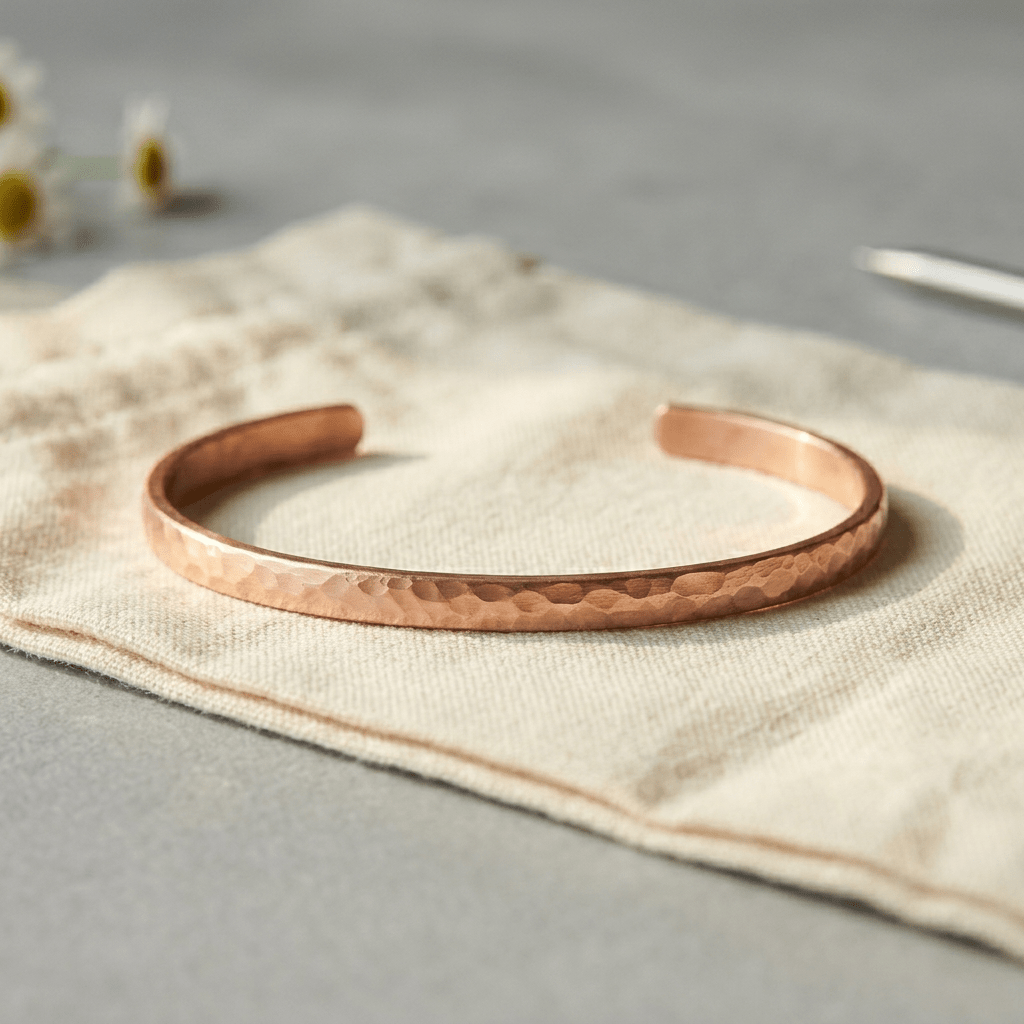 Woman wearing a hammered copper anklet