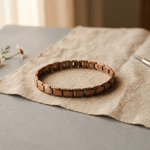 Copper link anklet worn around an ankle