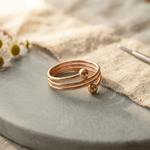 Woman wearing a triple coil copper ring