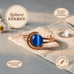 Copper cuff bracelet set with three blue-grey stones