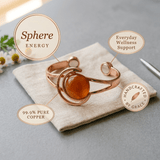 Copper cuff bracelet with a hand-set amber stone