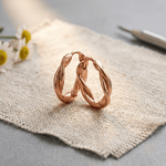 Twisted copper hoop earrings