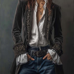 Woman wearing a long embroidered velvet jacket