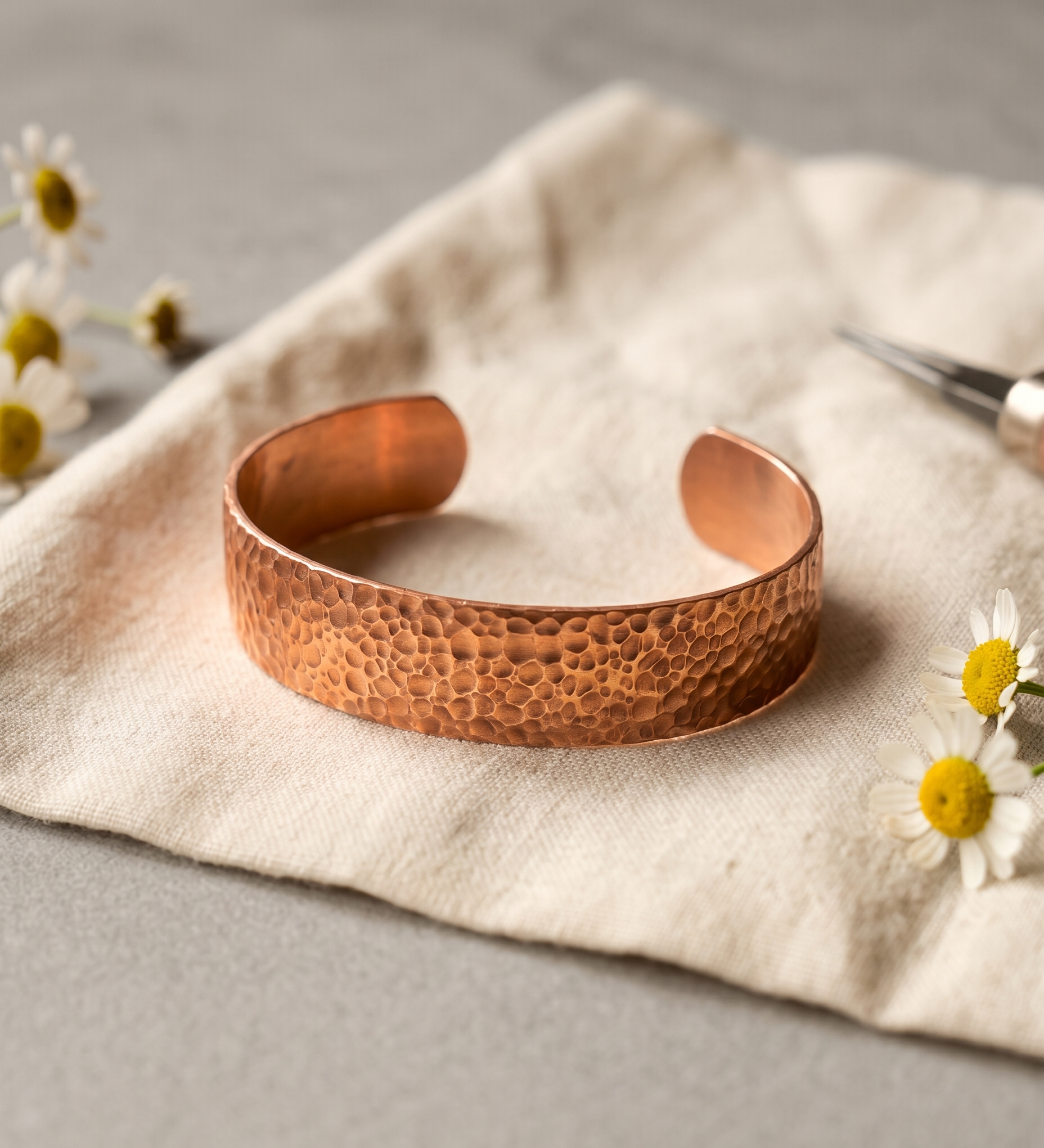 Dimpled copper cuff with hammered texture
