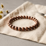 Etched agarwood bead bracelet