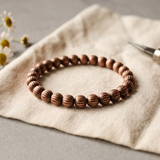 Etched agarwood bead bracelet