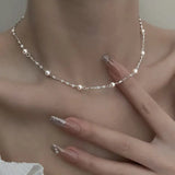Silver-Pearl Necklace by Eleanor Vale