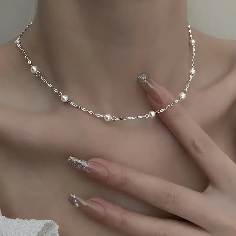 Silver-Pearl Necklace by Eleanor Vale