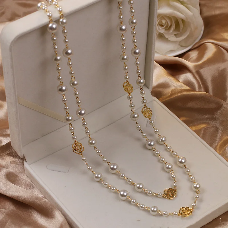 Rosette-Pearl Pendant Necklace by Eleanor Vale