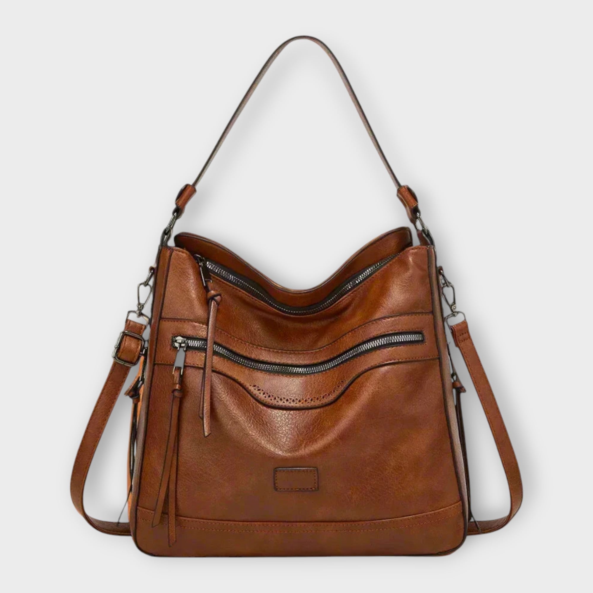 Punched-Arc Shoulder Bag by Eleanor Vale