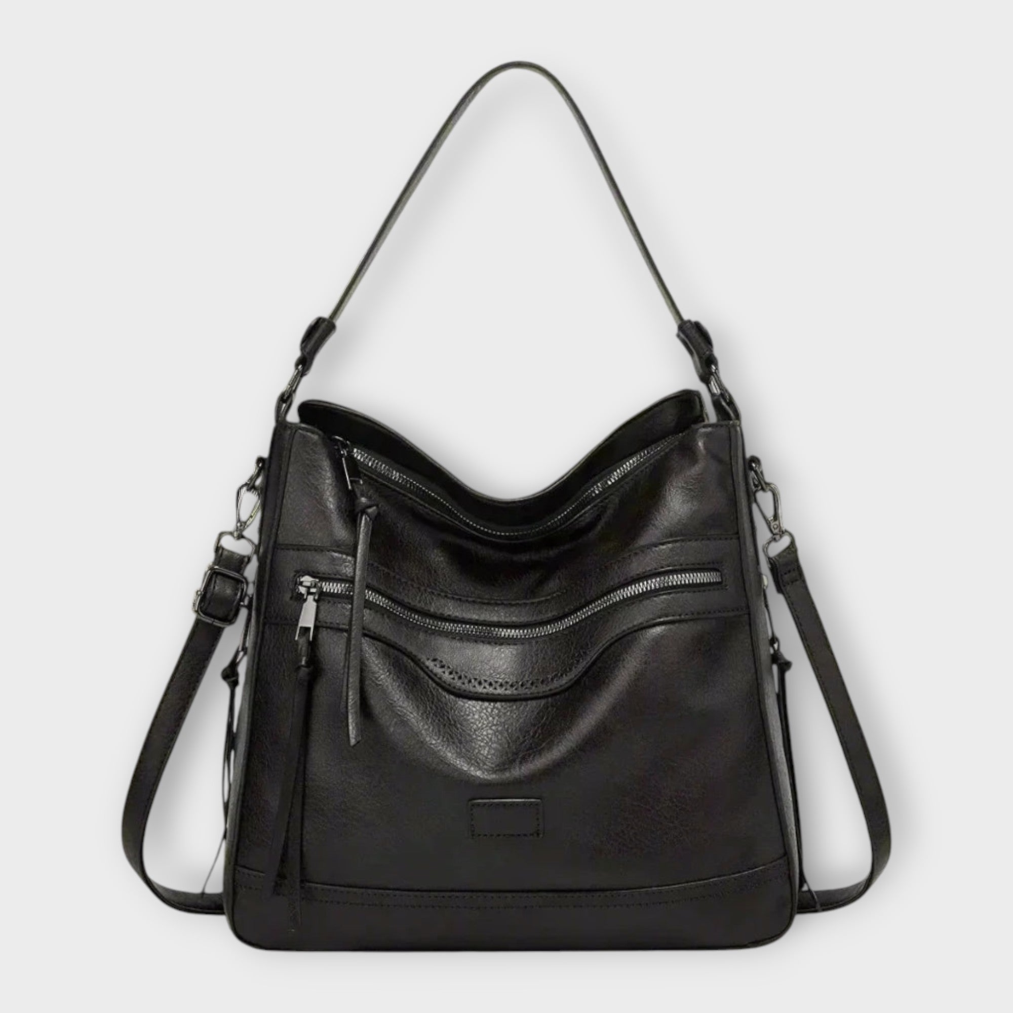 Punched-Arc Shoulder Bag by Eleanor Vale