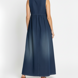 Woman wearing a long vintage-inspired denim maxi dress
