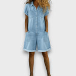Woman wearing a short vintage cotton jumpsuit with a denim-effect finish