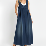 Woman wearing a long vintage-inspired denim maxi dress