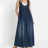 Woman wearing a long vintage-inspired denim maxi dress