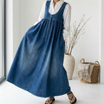 Woman wearing a long vintage-inspired denim maxi dress