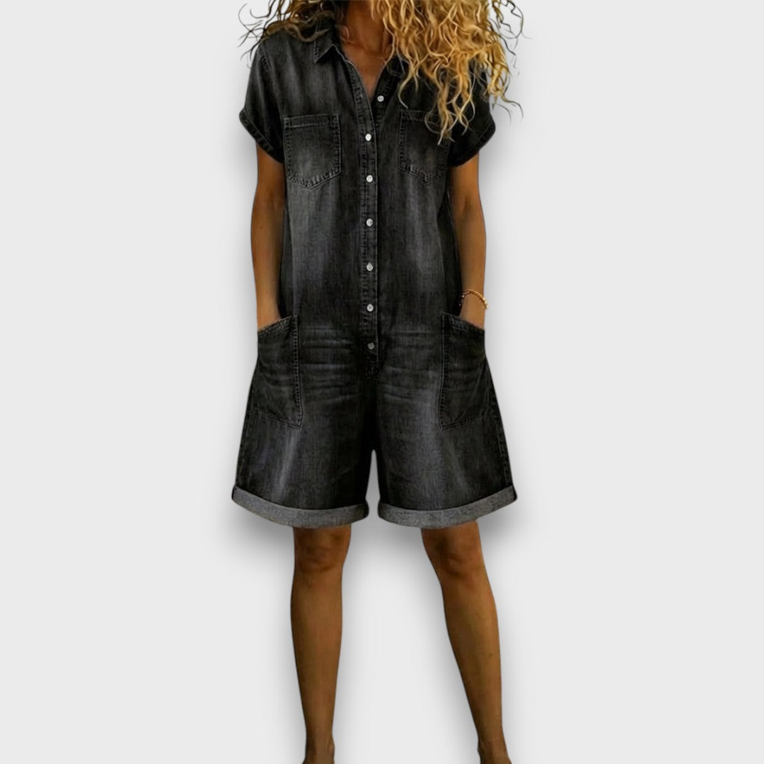Woman wearing a short vintage cotton jumpsuit with a denim-effect finish