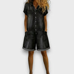 Woman wearing a short vintage cotton jumpsuit with a denim-effect finish
