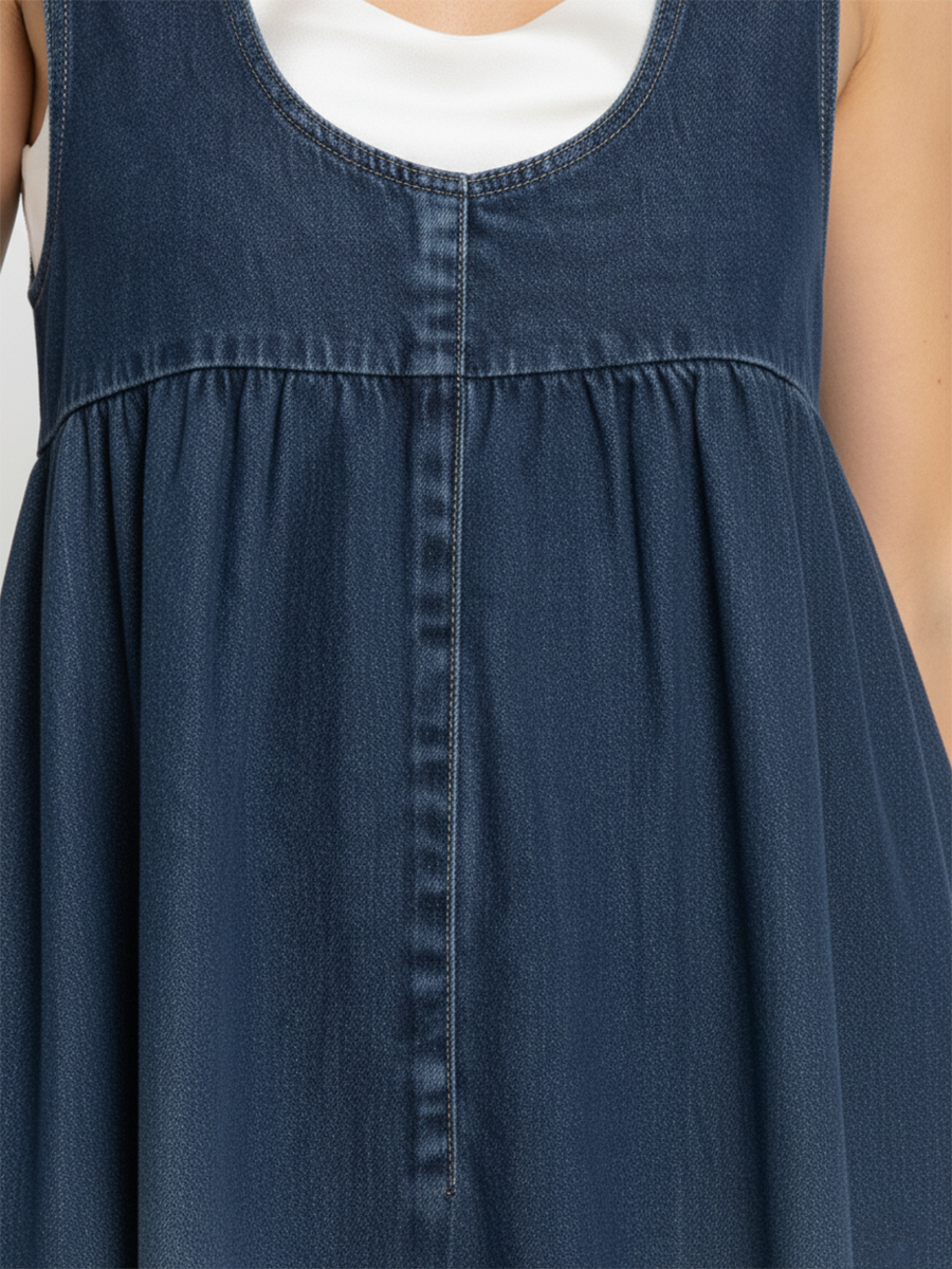 Woman wearing a long vintage-inspired denim maxi dress