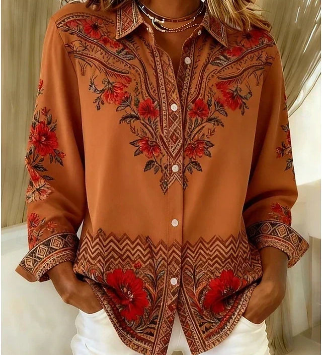 Woman wearing a terracotta floral print blouse