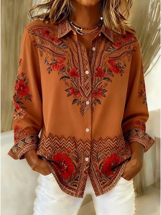 Woman wearing a terracotta floral print blouse